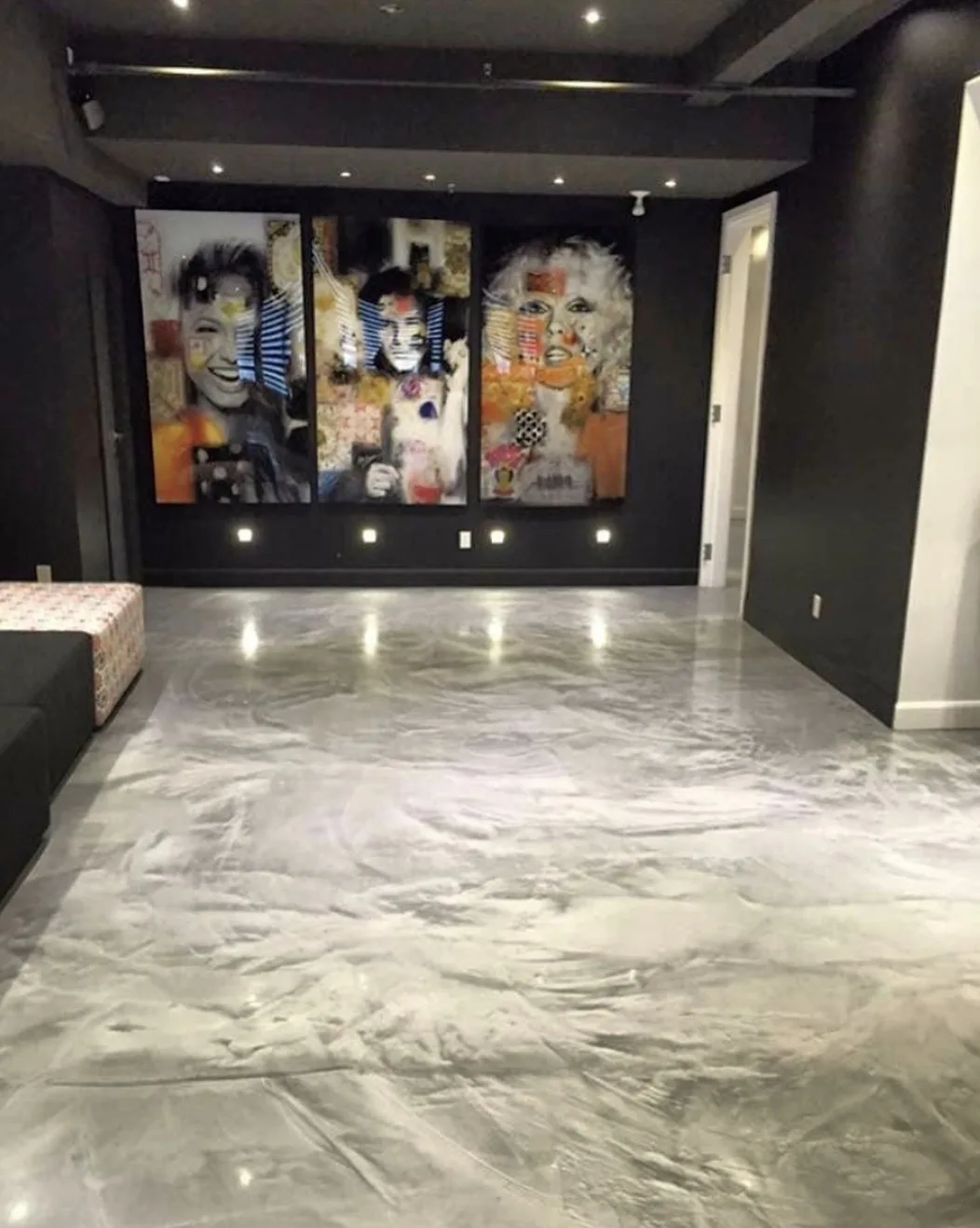 Silvery pearlescent metallic epoxy floor in an art studio