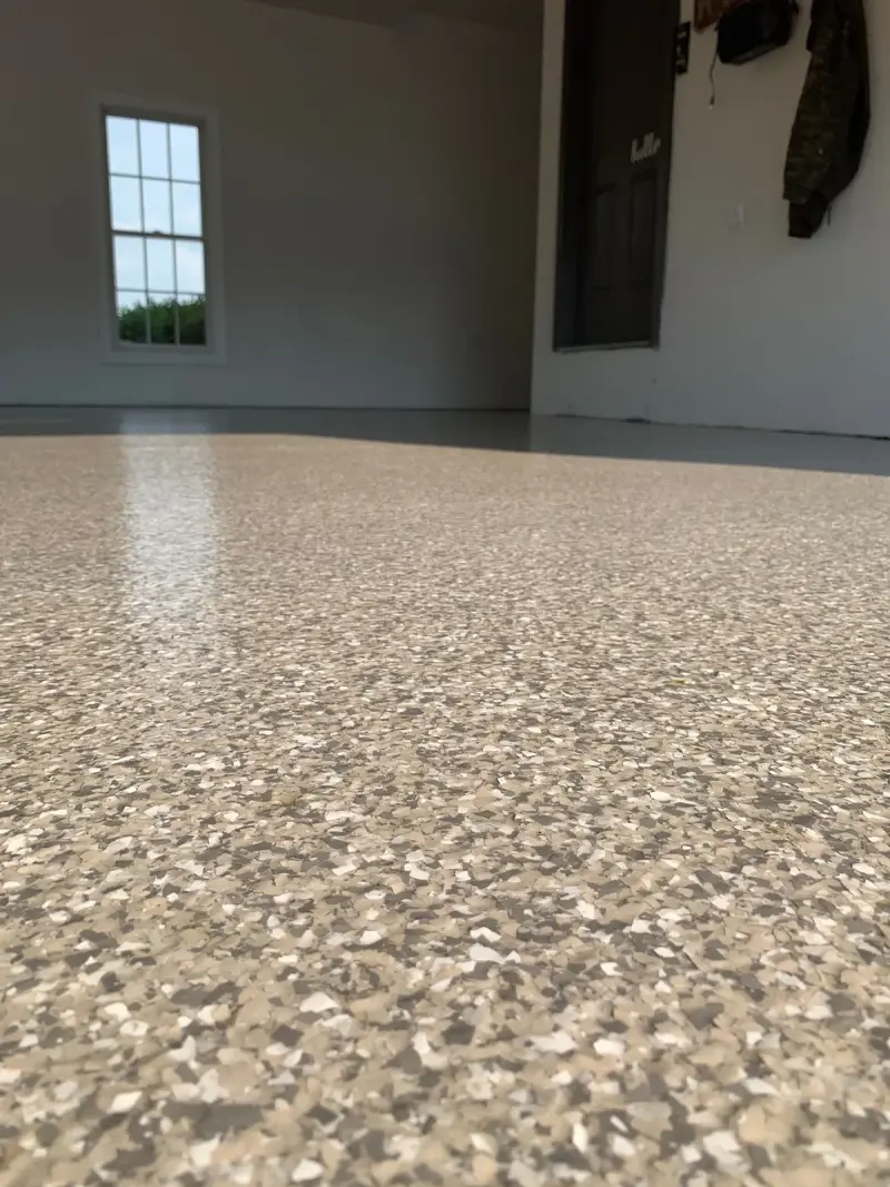 Finished gray flake epoxy floor close-up