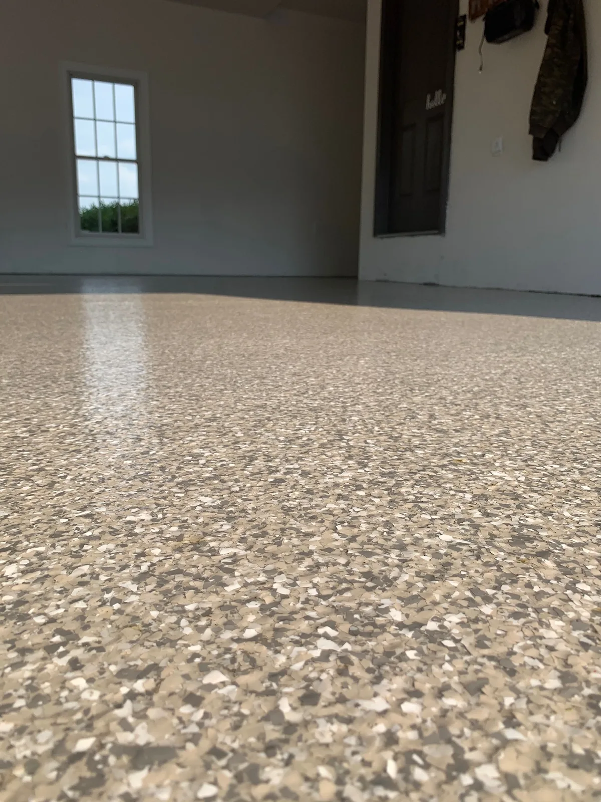 Finished gray flake epoxy floor close-up