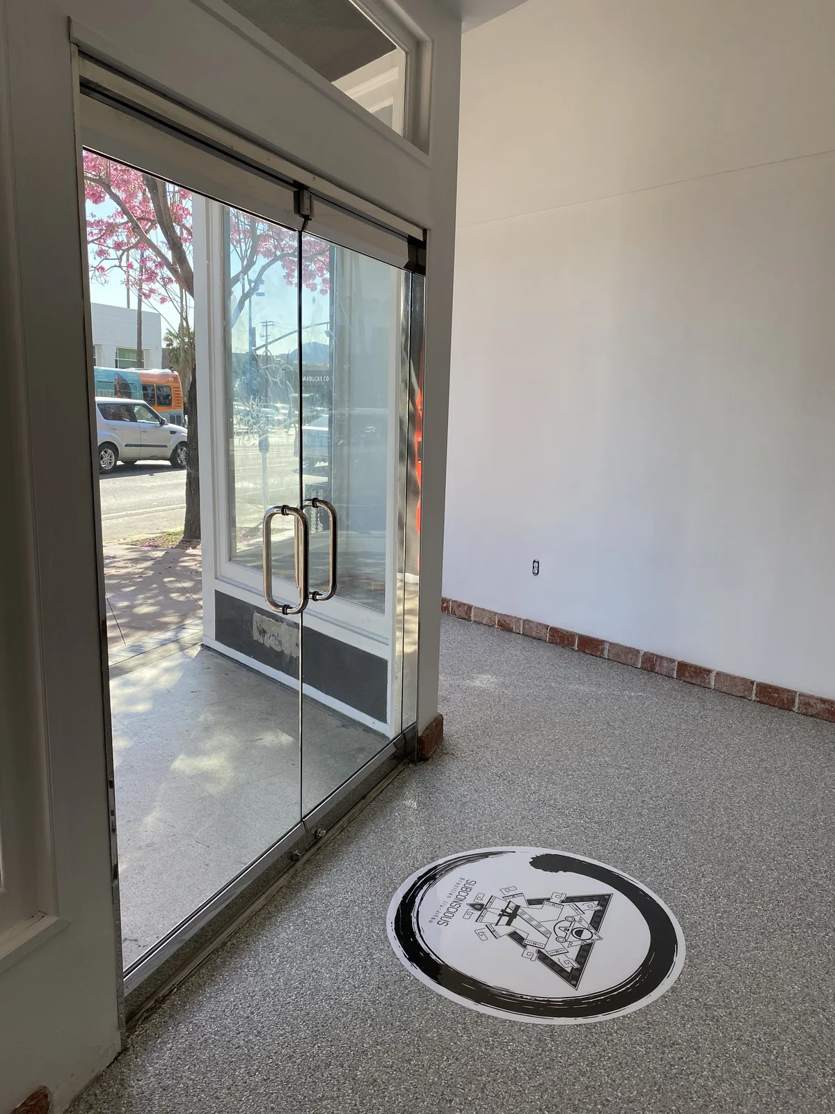 Flake epoxy floor with a custom logo